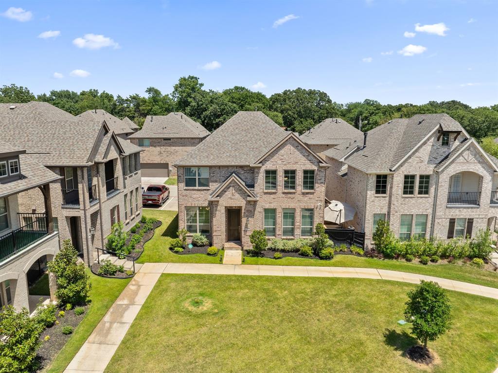 744 Patriot Lane Irving, TX 75060 - Photo 37 of 40 a front view of a residential houses with yard and green space