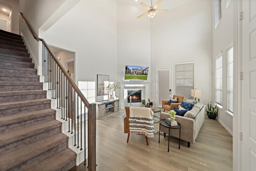 744 Patriot Lane Irving, TX 75060 - Photo 5 of 40 a living room with furniture and a fireplace