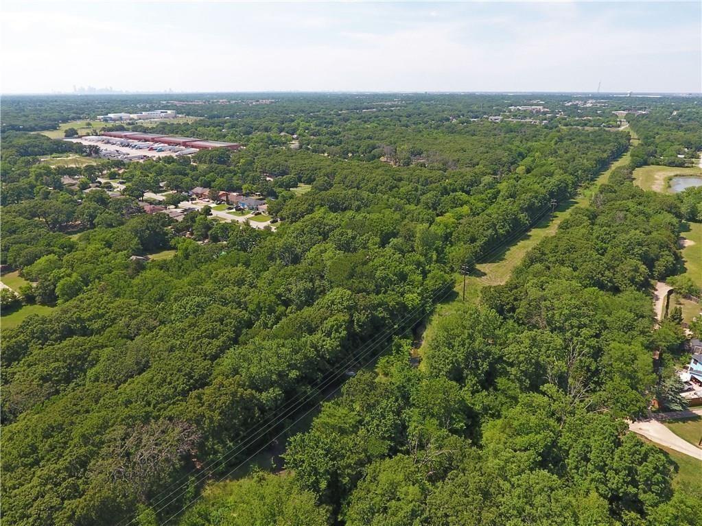 11517 Oak Tree Road Balch Springs, TX 75180 - Photo 2 of 7 an aerial view of residential houses with outdoor space and trees