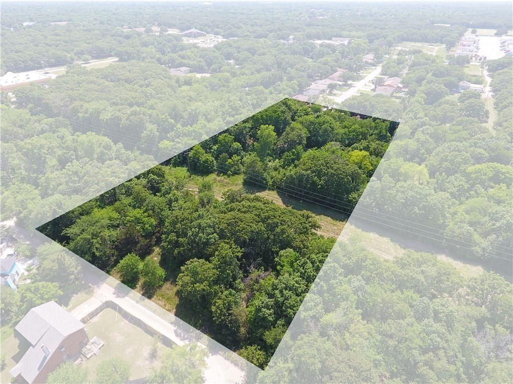 11517 Oak Tree Road Balch Springs, TX 75180 - Photo 6 of 7 a view of a garden with an outdoor space