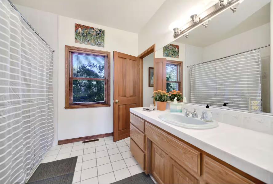 22707 Upton Road Plymouth, CA 95669 - Photo 12 of 26 a bathroom with a sink a vanity and a mirror