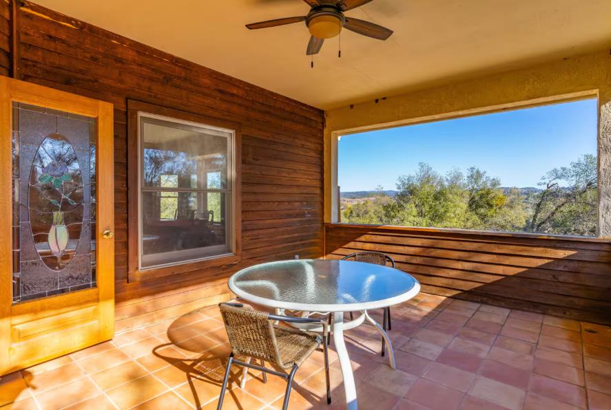 22707 Upton Road Plymouth, CA 95669 - Photo 19 of 26 a view of a swimming pool with a seating space
