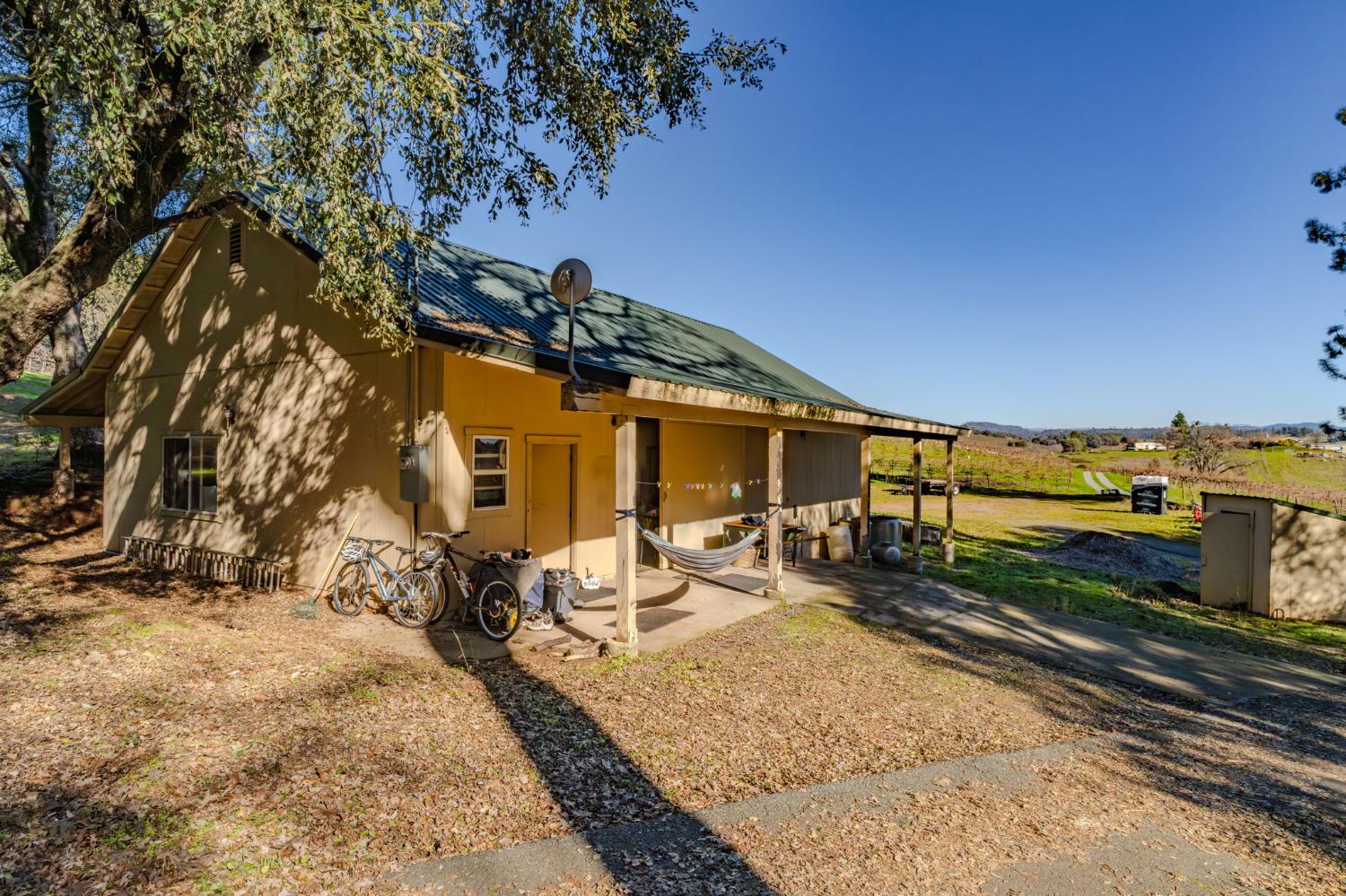 22707 Upton Road Plymouth, CA 95669 - Photo 73 of 99 a front view of a house with sitting area