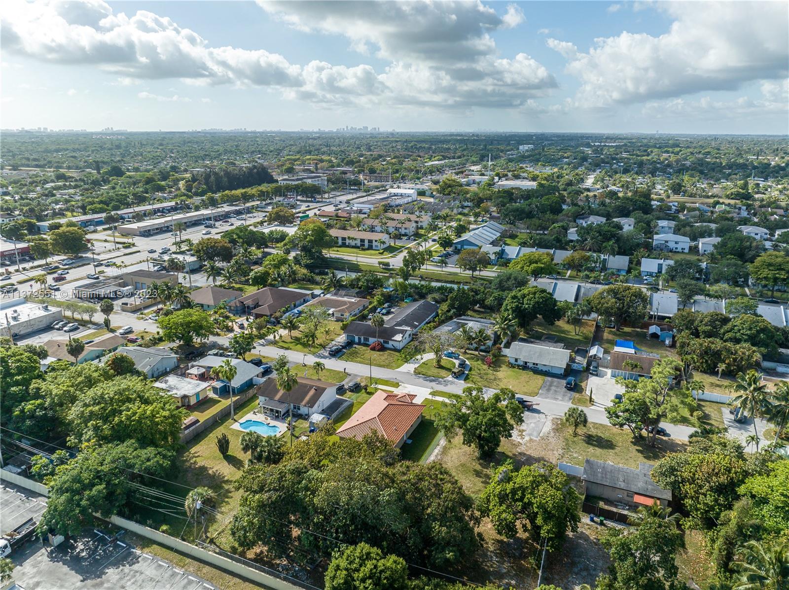 6109 Edwards Road Margate, FL 33063 - Photo 17 of 31 an aerial view of residential building with green space