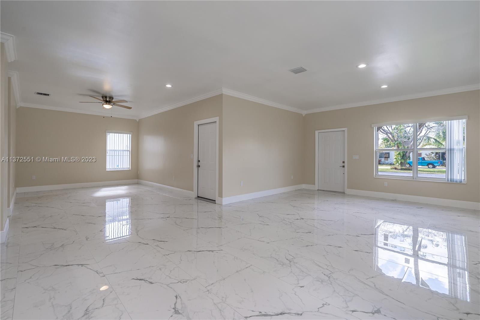 6109 Edwards Road Margate, FL 33063 - Photo 18 of 31 a view of an empty room and window