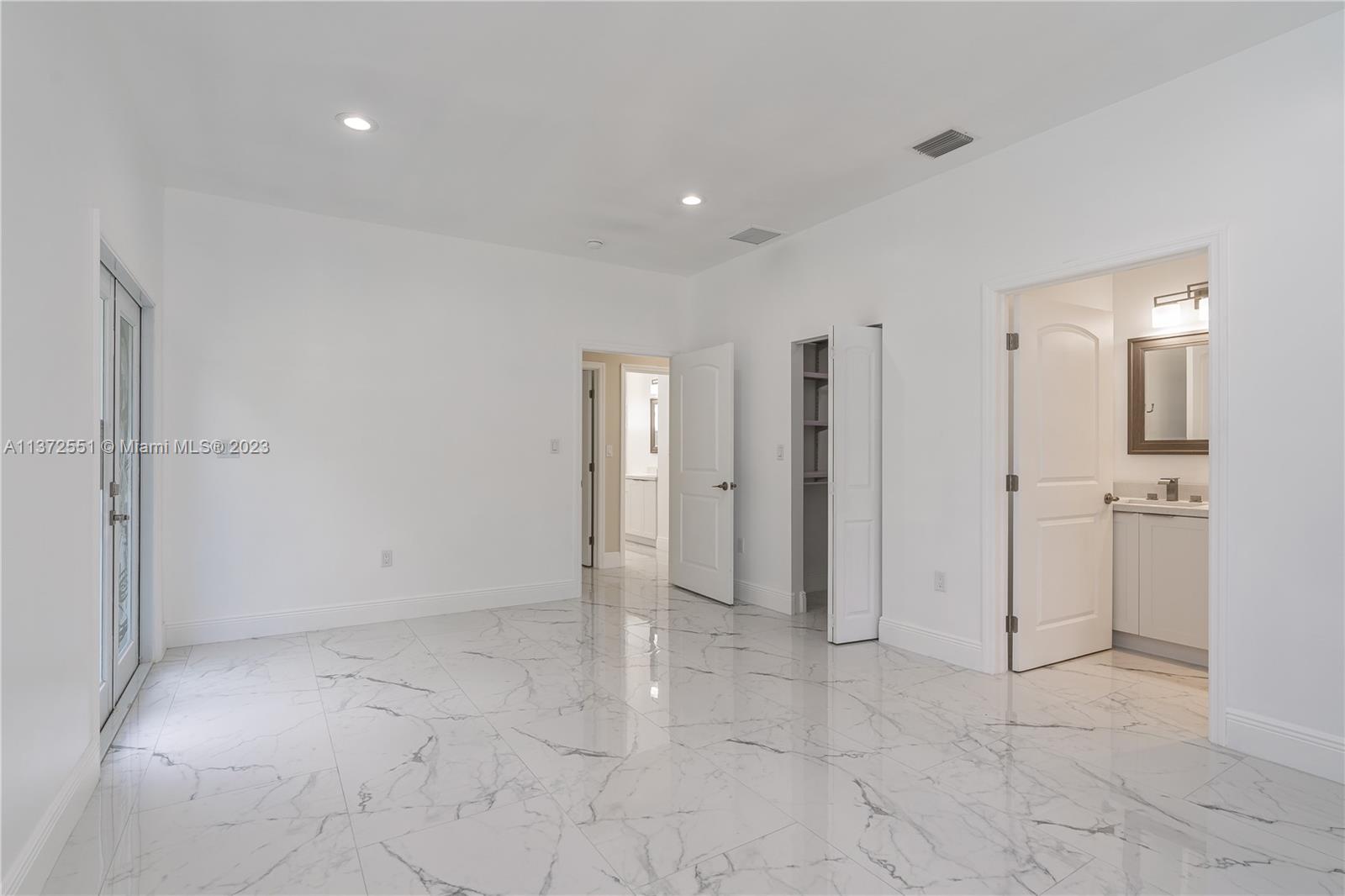 6109 Edwards Road Margate, FL 33063 - Photo 23 of 31 a view of a hallway with closet and entryway