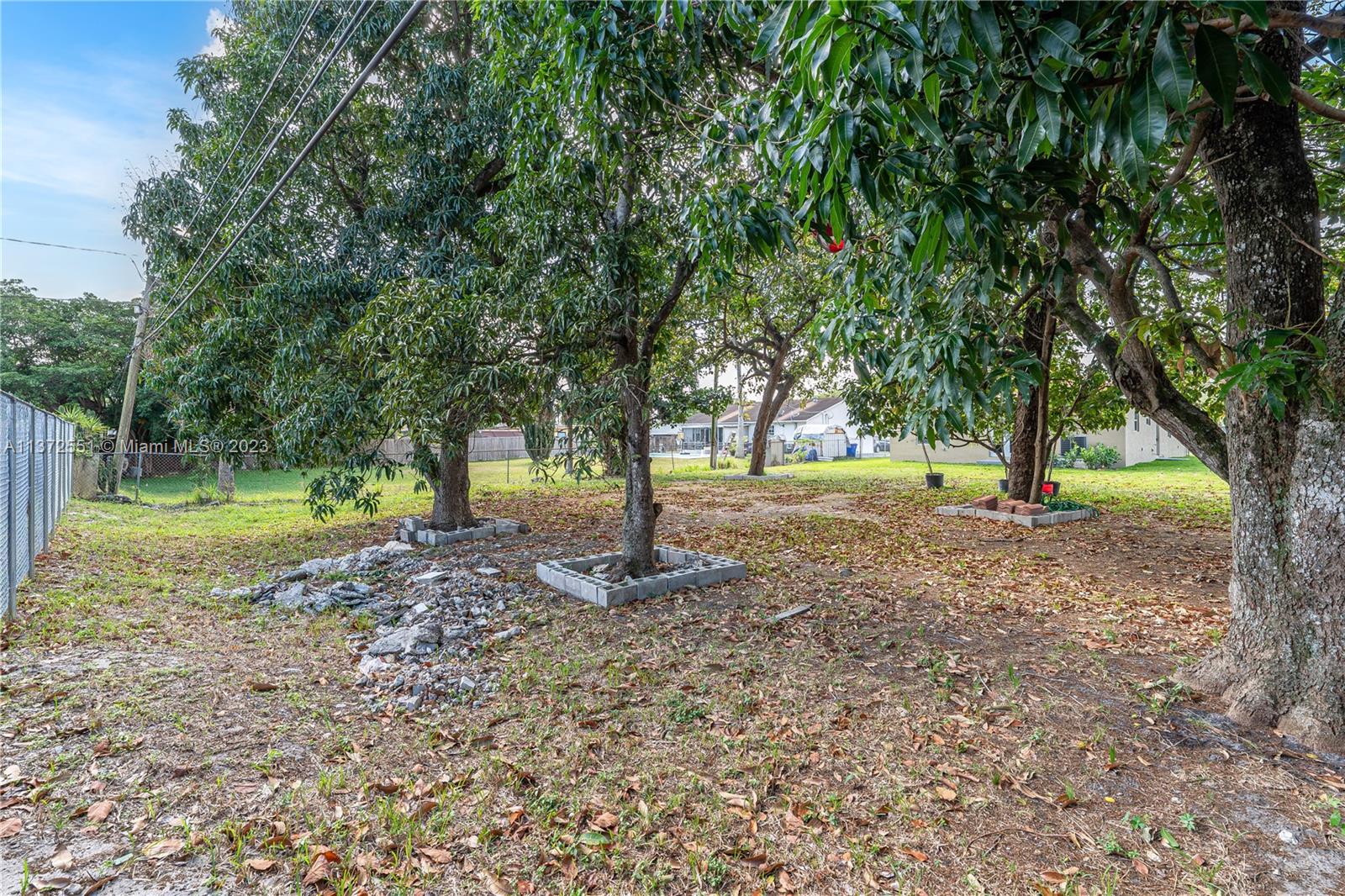 6109 Edwards Road Margate, FL 33063 - Photo 9 of 31 a view of outdoor space with trees
