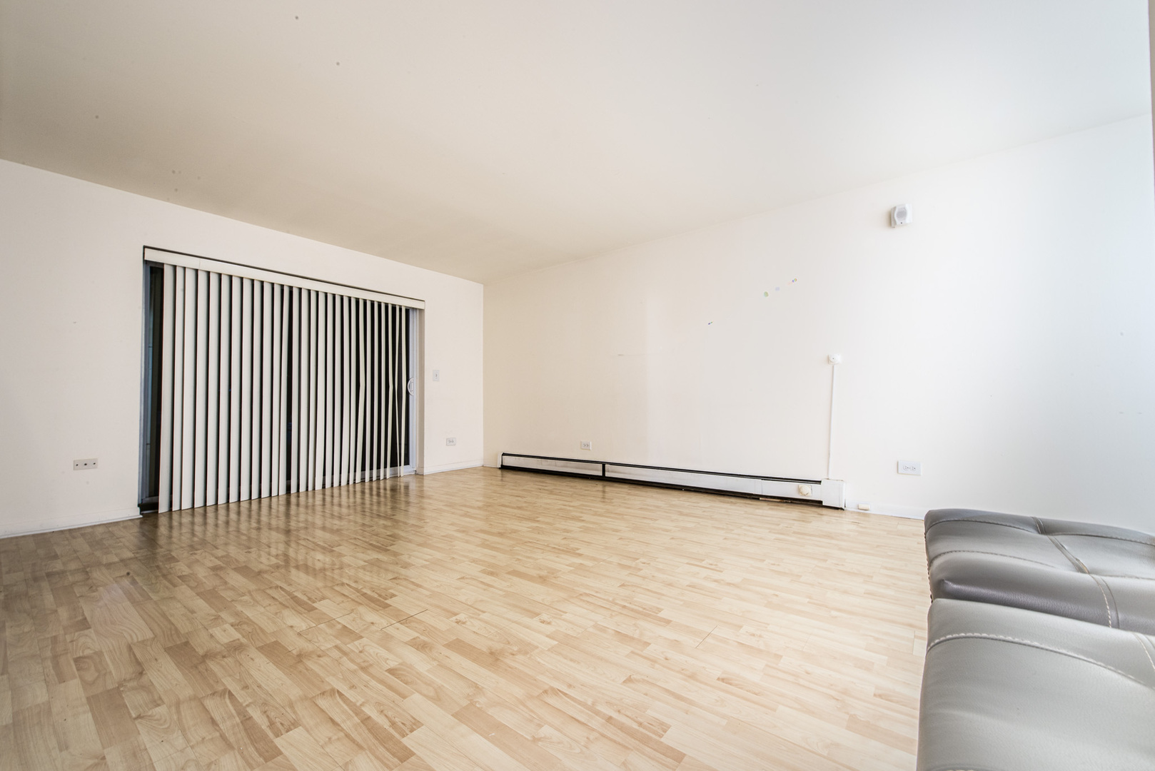 2226 South Goebbert Road, Unit 270 Arlington Heights, IL 60005 - Photo 10 of 27 a view of an empty room with wooden floor