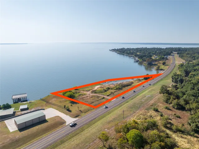 a view of an ocean and city