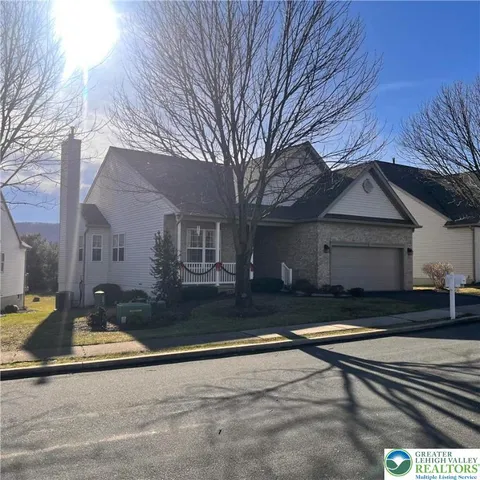 a front view of house with yard