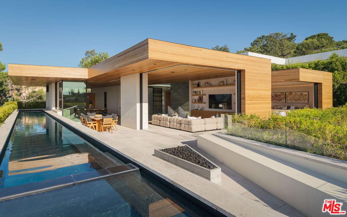 a view of a patio with chairs and tables