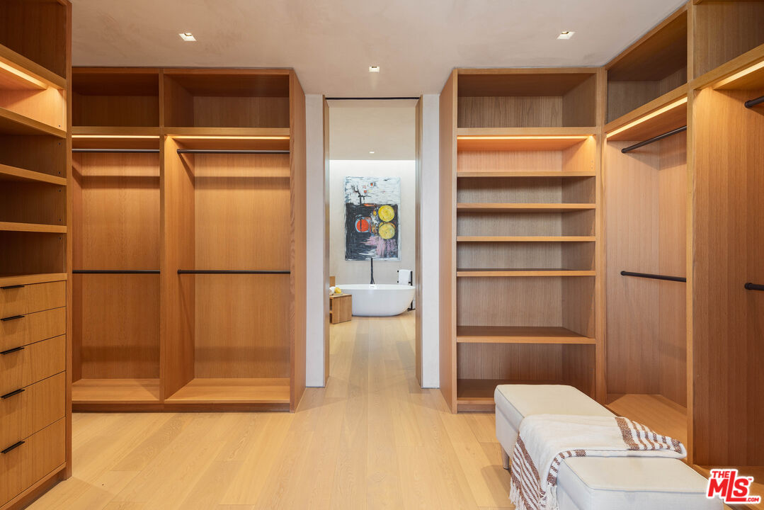 1520 Carla Ridge Beverly Hills, CA 90210 - Photo 15 of 24 a view of a walk in closet