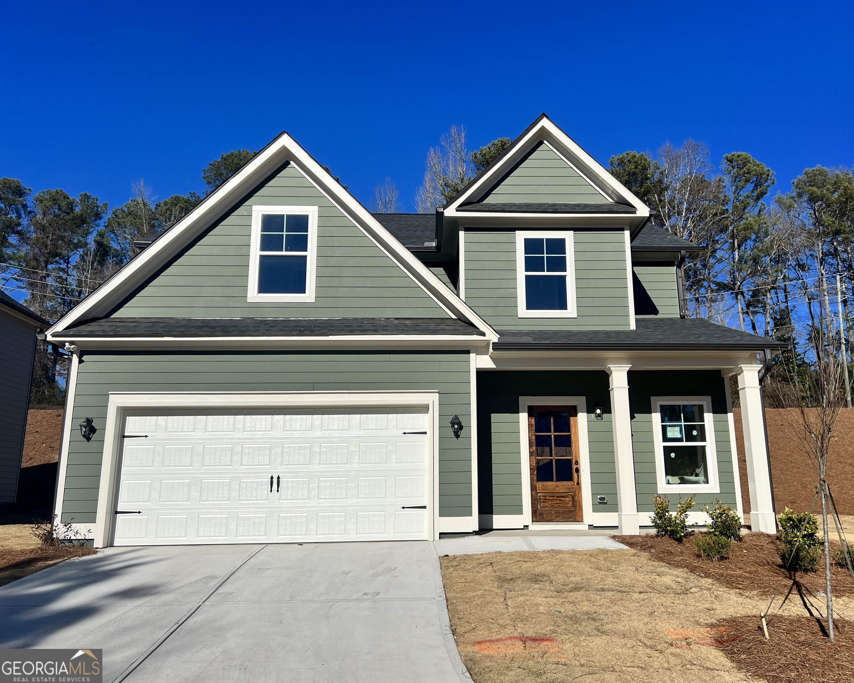 719 Mitchell Bridge Road, Unit B3 Athens, GA 30606 - Photo 1 of 1 a front view of a house with a yard