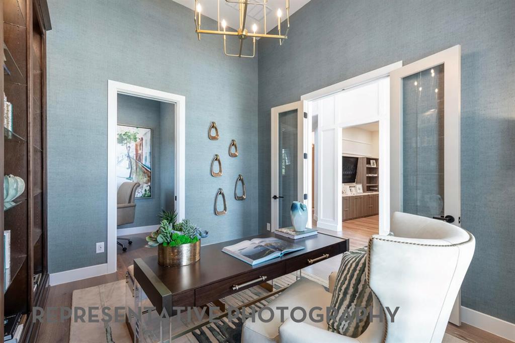 3908 Meander Way Prosper, TX 75078 - Photo 21 of 37 a living room with furniture and a potted plant