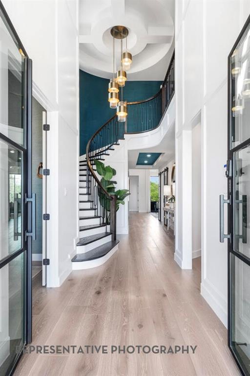 3908 Meander Way Prosper, TX 75078 - Photo 22 of 37 a view interior of a house and chandelier