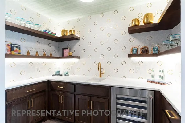 a kitchen with a sink and cabinets