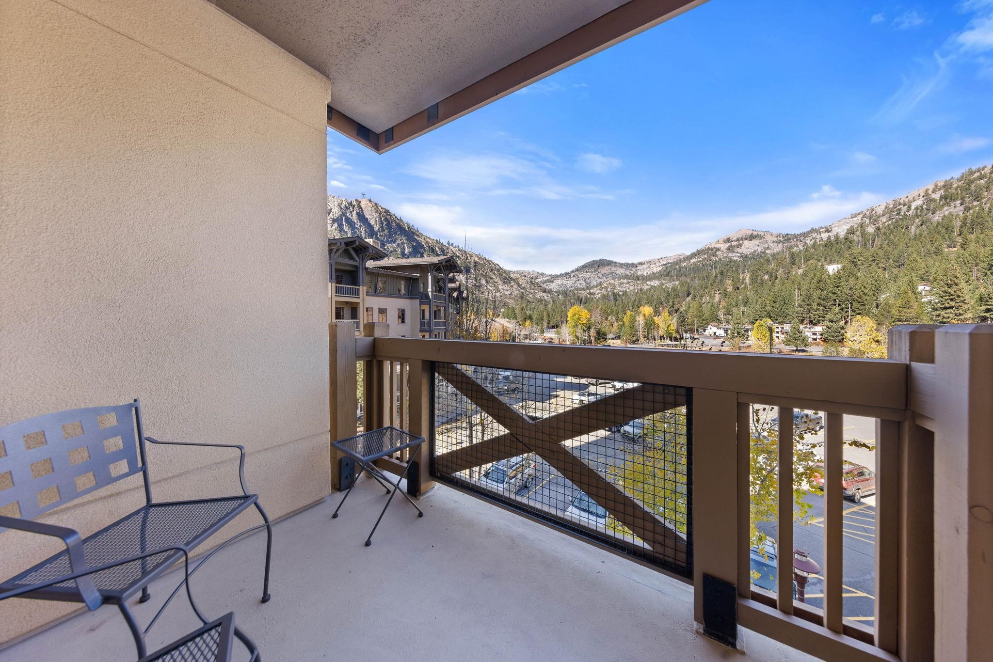 1850 Village South Road, Unit 4327 Olympic Valley, CA 96146 - Photo 7 of 25 a view of a balcony with furniture and a mountain view