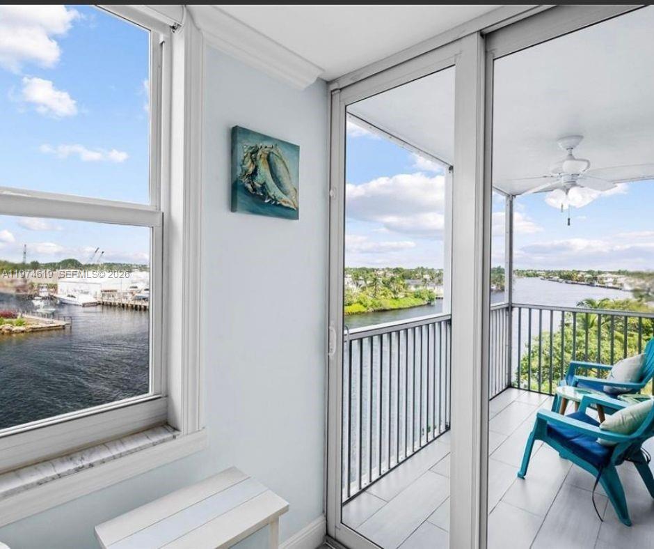 1505 North Riverside Drive, Unit 505 Pompano Beach, FL 33062 - Photo 2 of 9 a view of a balcony with furniture
