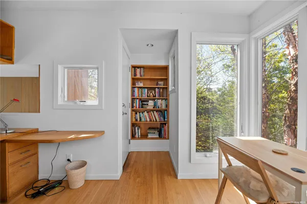 a room with furniture and flat screen tv
