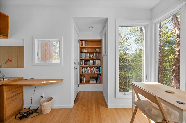a room with furniture and flat screen tv
