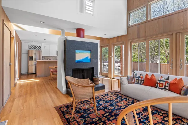 a bedroom with furniture and a fireplace