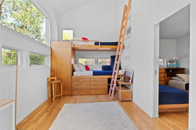 a white toilet sitting next to a bathroom sink and shower