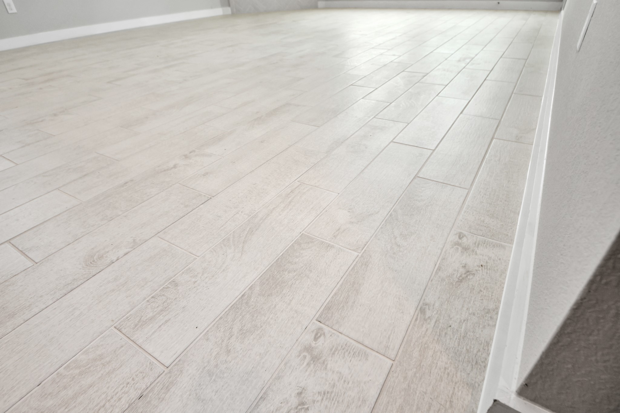 2946 Burris Park Drive Spring, TX 77373 - Photo 19 of 45 The premium tile flooring adds a touch of luxury to the space, creating the perfect setting for relaxing moments and cherished gatherings with loved ones.