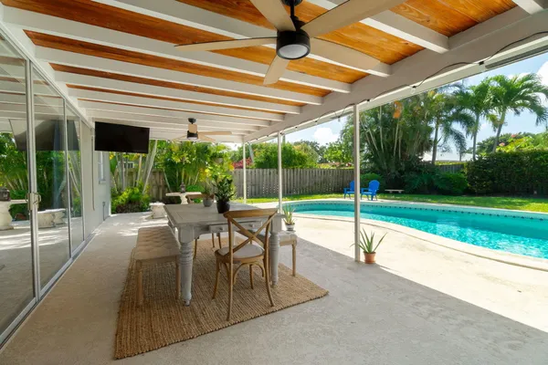 a house view with a sitting space and garden view