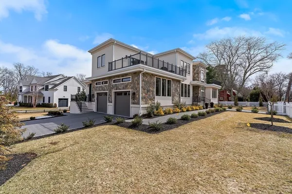 a view of a town with large trees