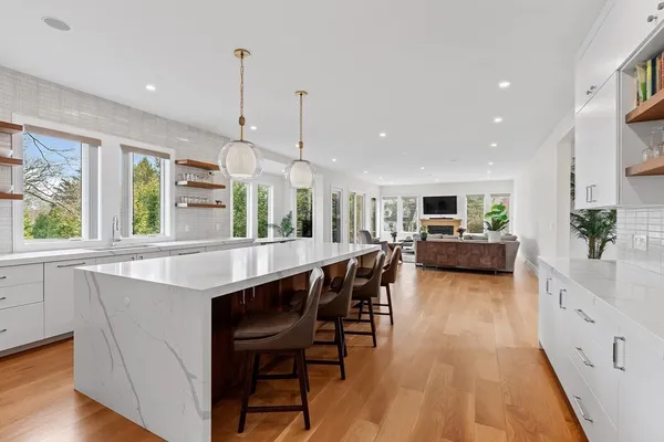 a kitchen with a table and chairs in it