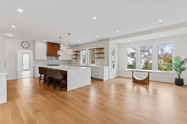 a view of kitchen with dining table and chairs