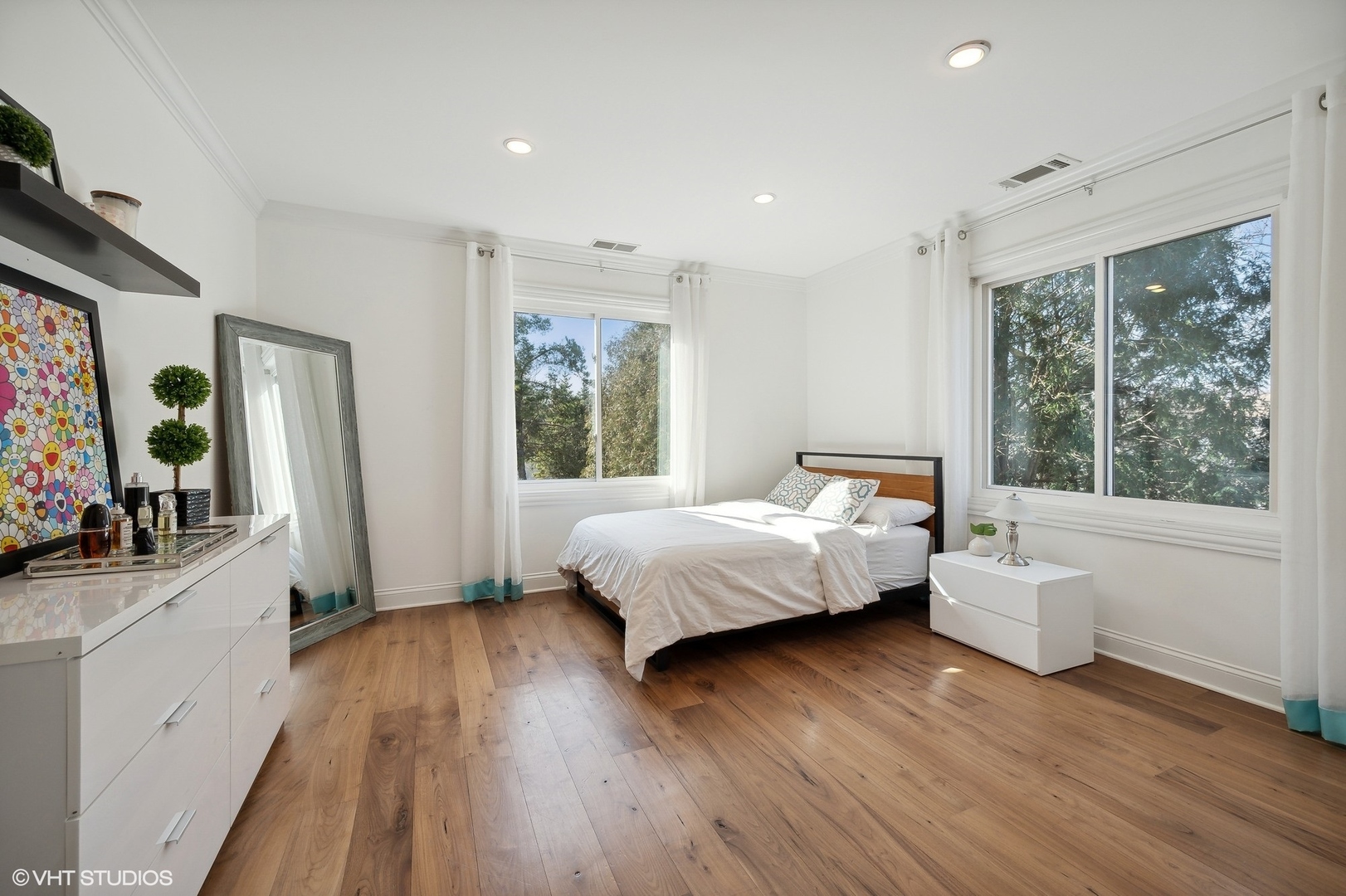 1640 Pfingsten Road Northbrook, IL 60062 - Photo 22 of 34 a bedroom with a large bed and a large window