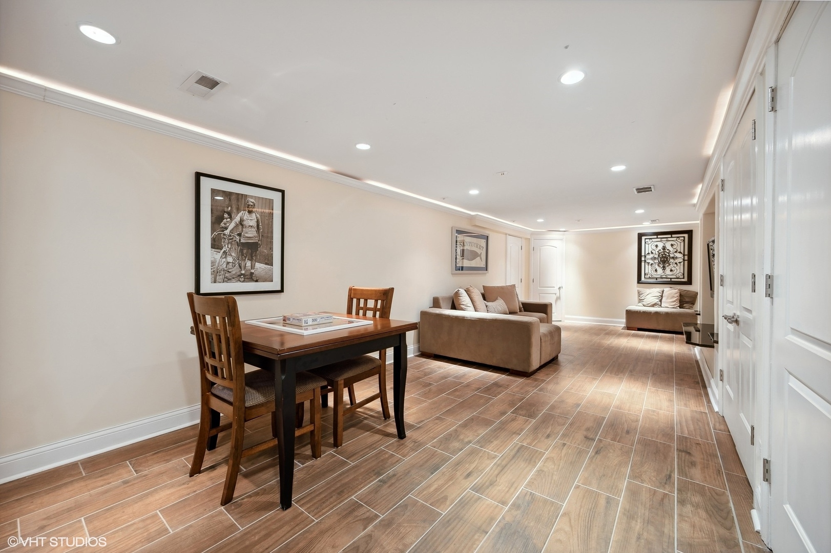1640 Pfingsten Road Northbrook, IL 60062 - Photo 26 of 34 a living room with furniture a table and wooden floor