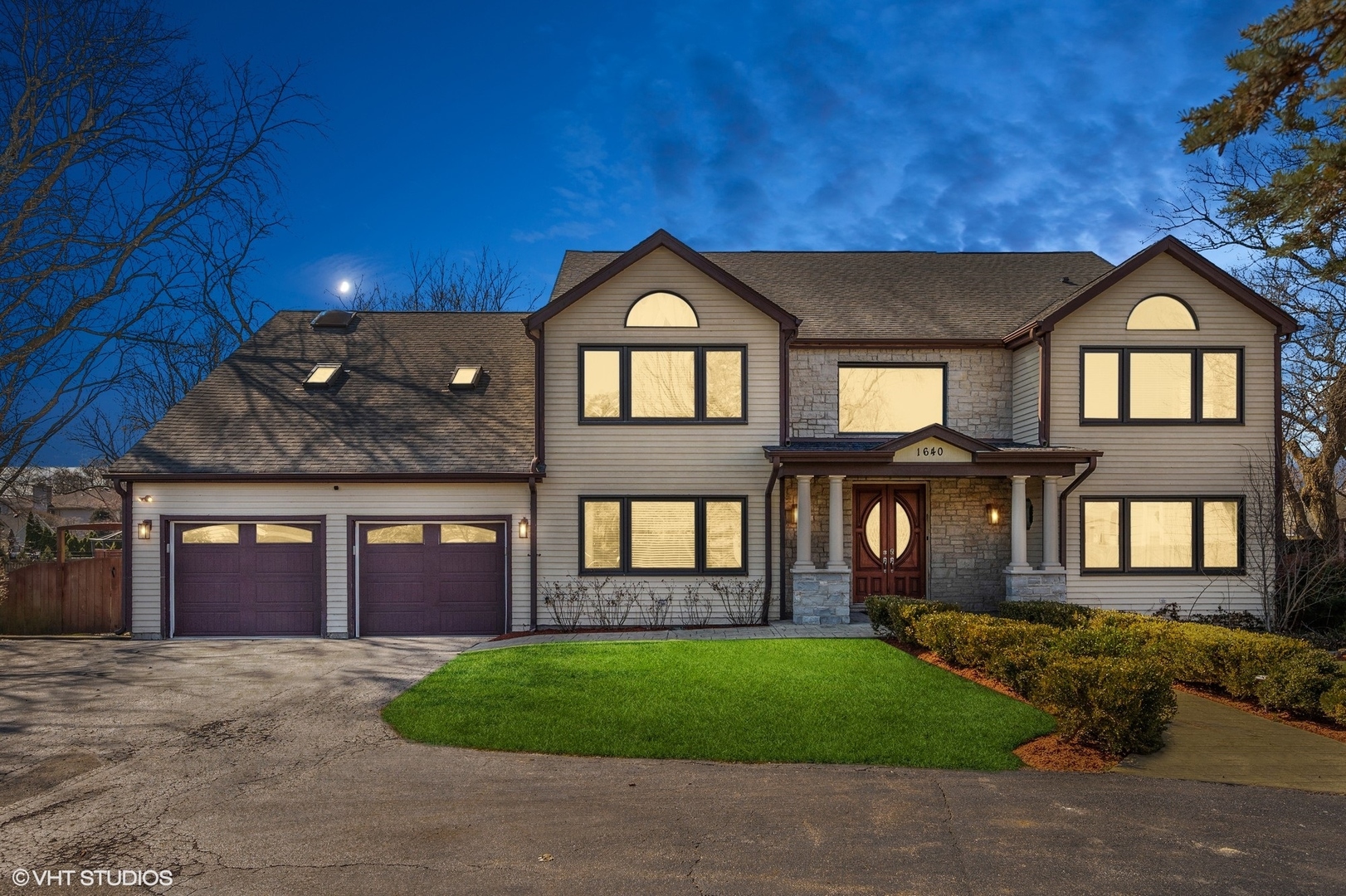 1640 Pfingsten Road Northbrook, IL 60062 - Photo 30 of 34 a front view of a house with a garden and yard