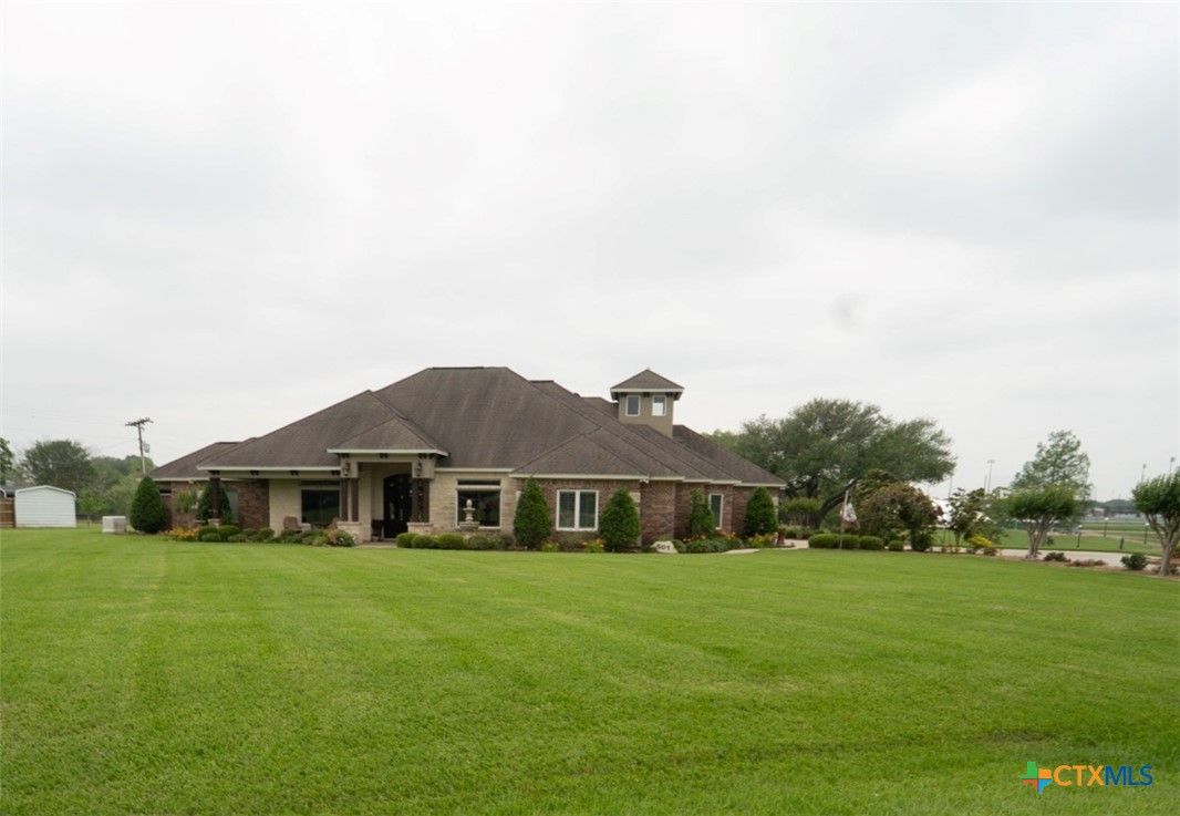 501 Barbara Street Ganado, TX 77962 - Photo 2 of 43 a front view of house with yard and green space