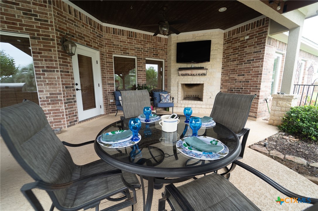 501 Barbara Street Ganado, TX 77962 - Photo 27 of 43 Dining al fresco under the pergola, with fans gently keeping the air moving or cozying up to a wood burning fireplace will easily become a favorite past time. Fire up the grill, turn on some music and take a splash in the pool or hot tub.