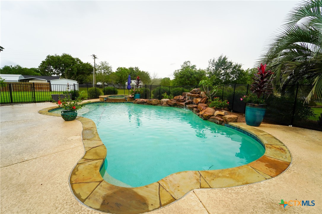 501 Barbara Street Ganado, TX 77962 - Photo 30 of 43 an aerial view of a house with swimming pool garden and patio