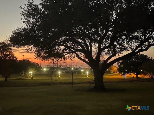 501 Barbara Street Ganado, TX 77962 - Photo 37 of 43 Yet another benefit this amazing offering is the ambiance the lighted trail provides every evening. This location is quite exclusive and views are rare or impossible to replicate, and yet, this could be yours!