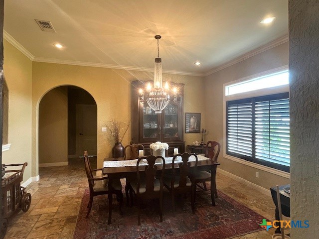 501 Barbara Street Ganado, TX 77962 - Photo 5 of 43 a view of a dining room with furniture and chandelier
