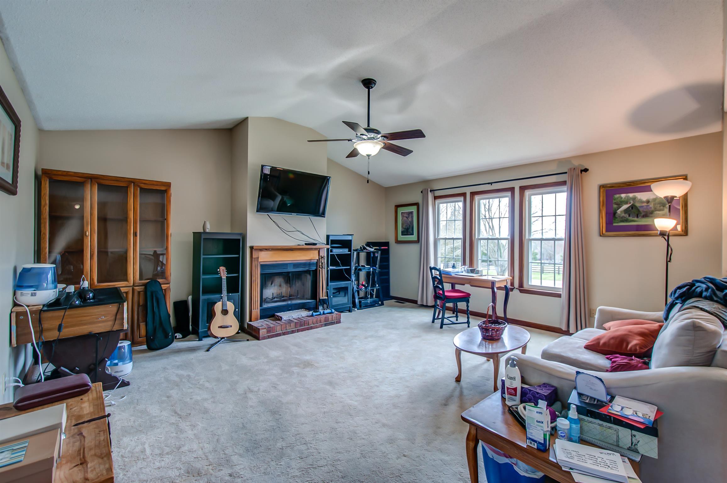 2142 Clara Mathis Road Spring Hill, TN 37174 - Photo 4 of 20 a living room with furniture and a flat screen tv