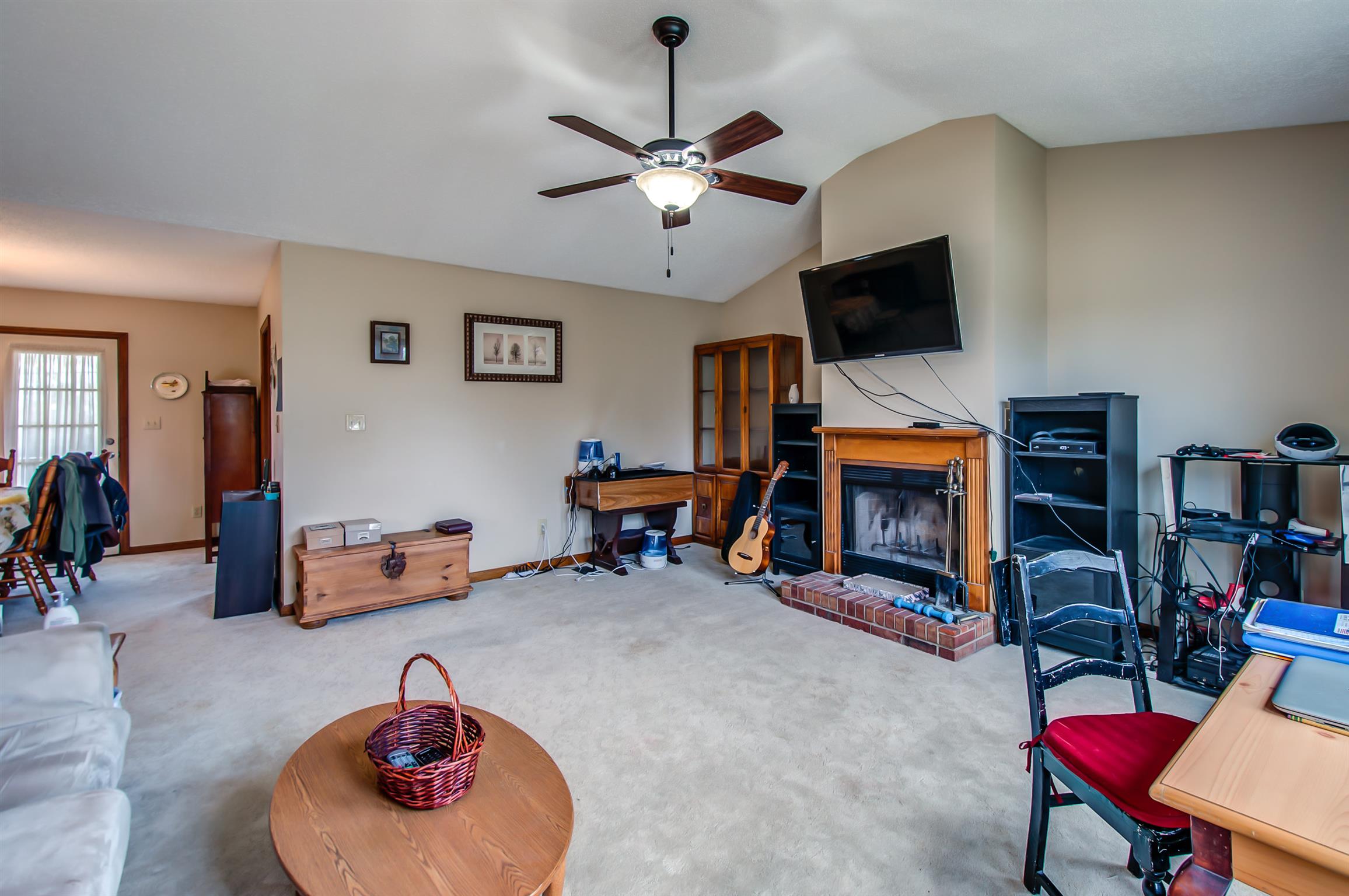 2142 Clara Mathis Road Spring Hill, TN 37174 - Photo 5 of 20 a living room with furniture and a flat screen tv