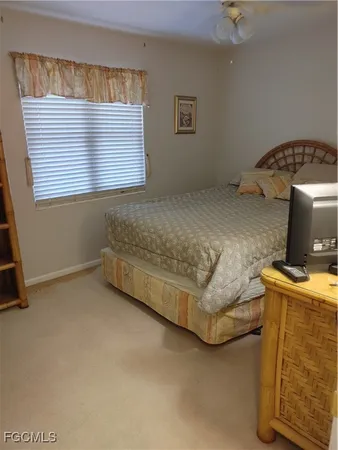 a kitchen with a sink appliances and cabinets