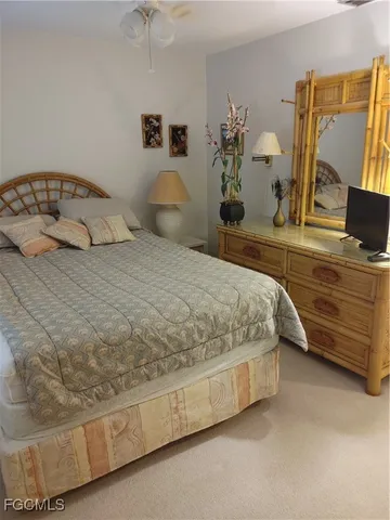 a view of a refrigerator in kitchen and wooden floor
