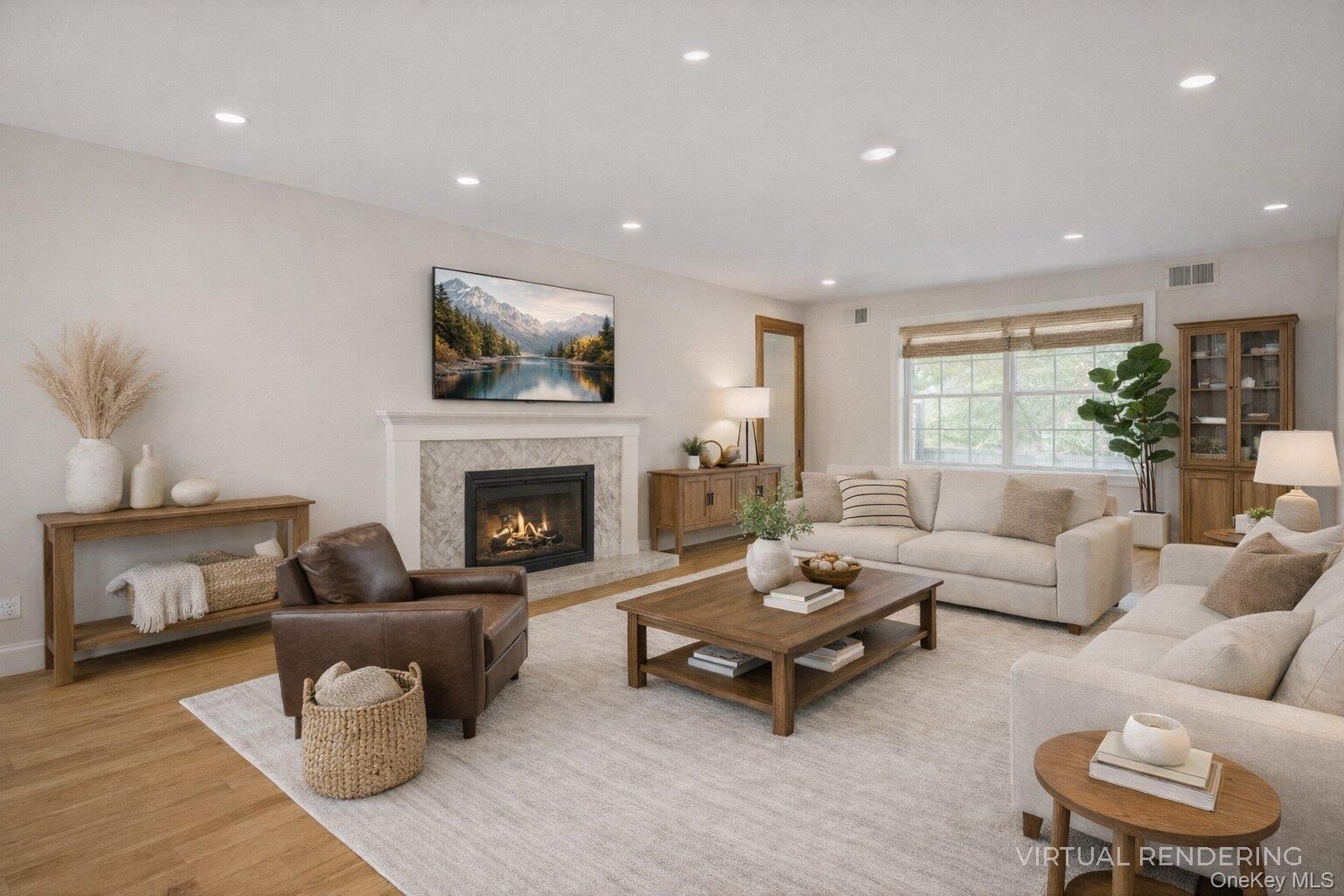 17 Jennifers Path Westhampton Beach, NY 11978 - Photo 18 of 41 a living room with furniture and a fireplace