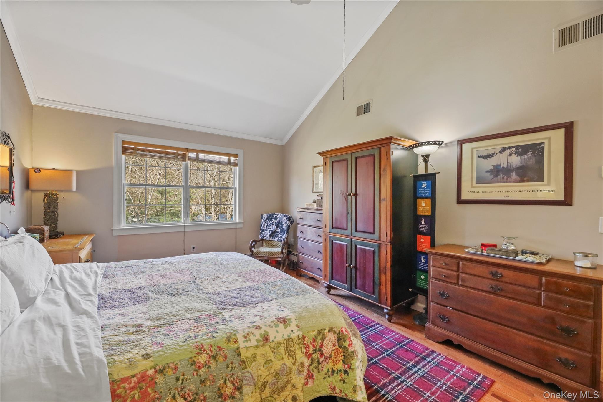 17 Jennifers Path Westhampton Beach, NY 11978 - Photo 21 of 41 a bedroom with a bed dresser and a window