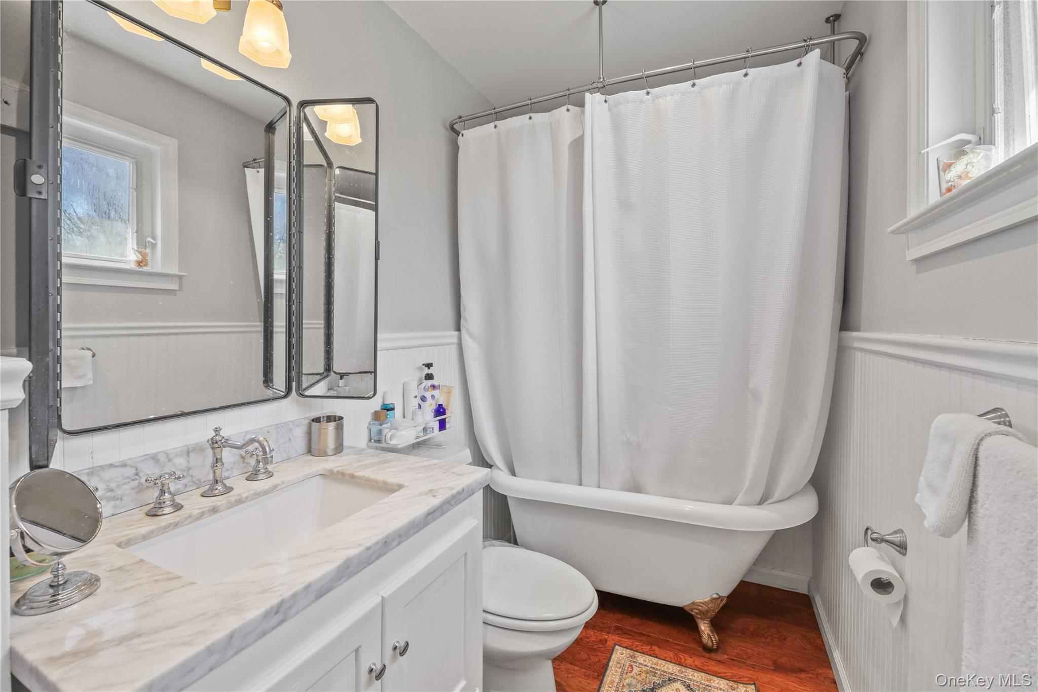 17 Jennifers Path Westhampton Beach, NY 11978 - Photo 29 of 41 a bathroom with a granite countertop sink toilet and shower