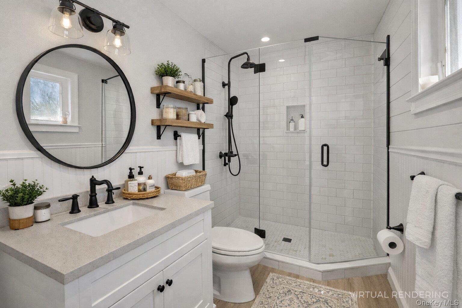 17 Jennifers Path Westhampton Beach, NY 11978 - Photo 30 of 41 a bathroom with a sink a toilet and a mirror