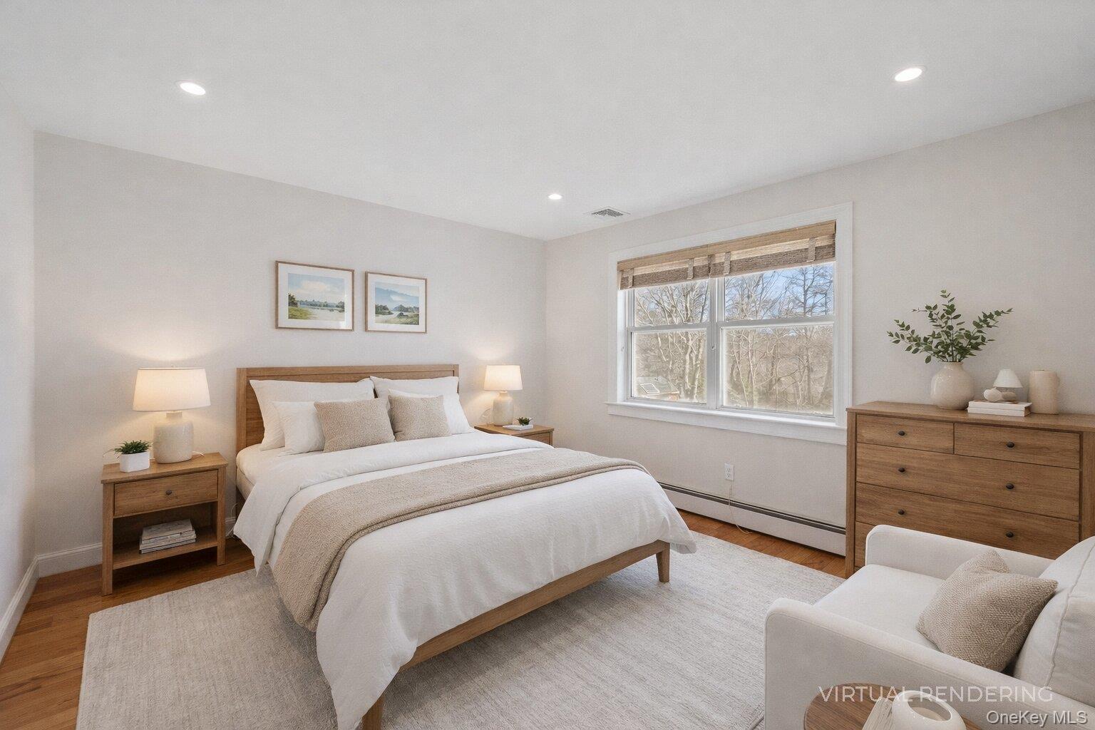 17 Jennifers Path Westhampton Beach, NY 11978 - Photo 32 of 41 a bedroom with a bed and a window