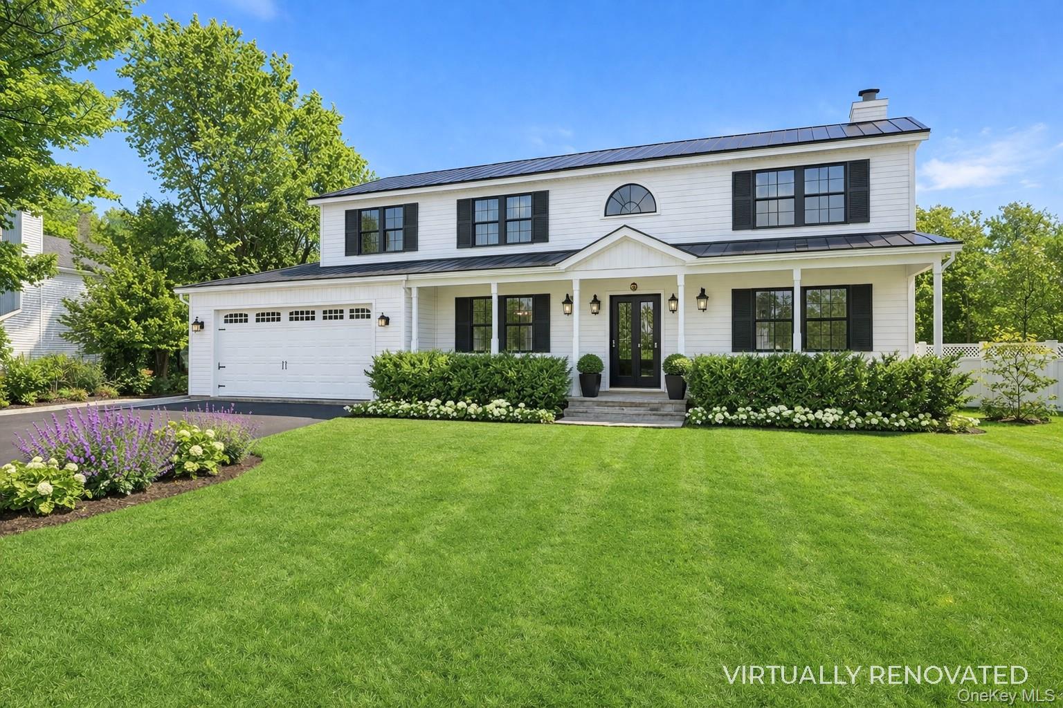 17 Jennifers Path Westhampton Beach, NY 11978 - Photo 5 of 41 a front view of a house with a yard
