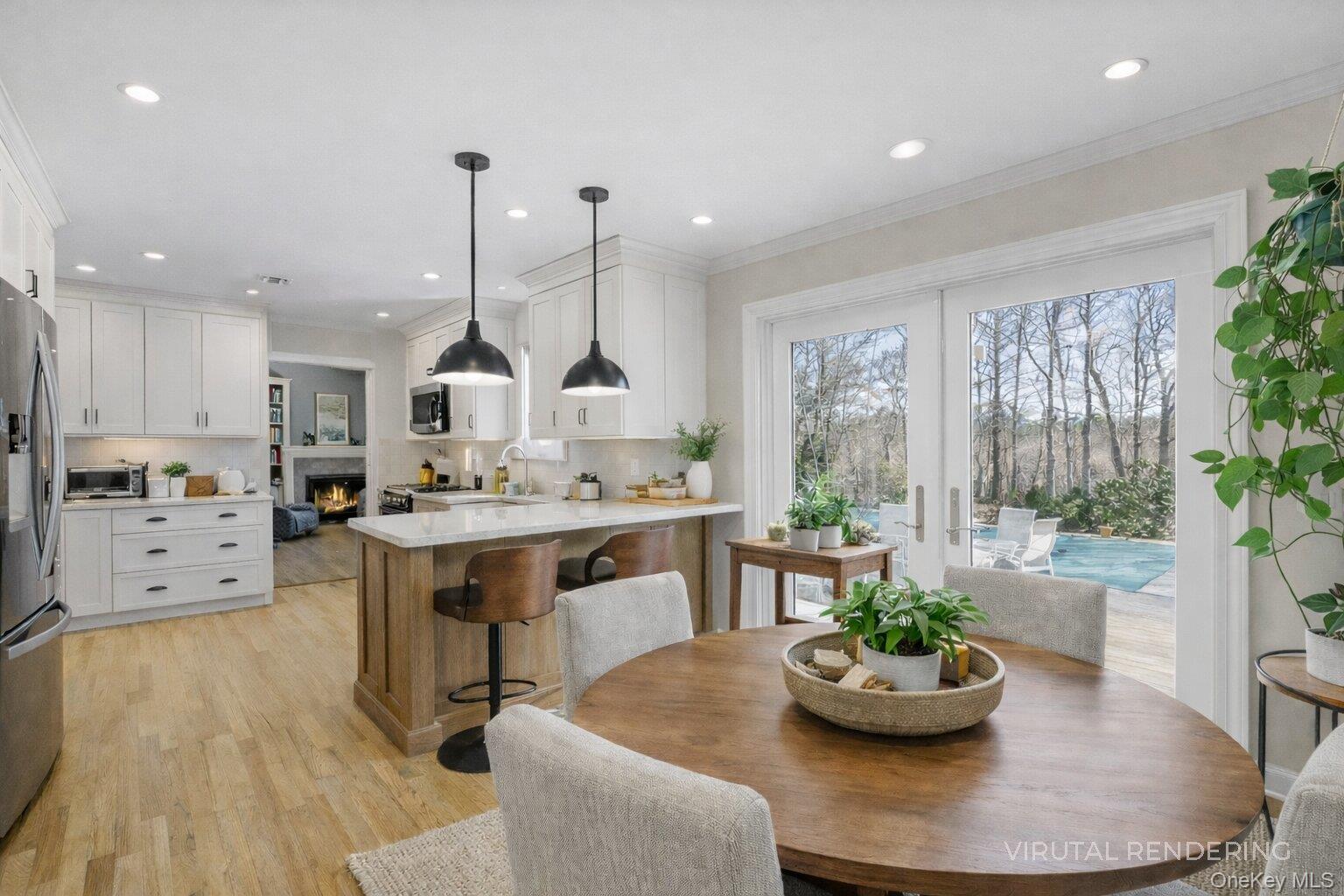 17 Jennifers Path Westhampton Beach, NY 11978 - Photo 9 of 41 a kitchen with a table and chairs